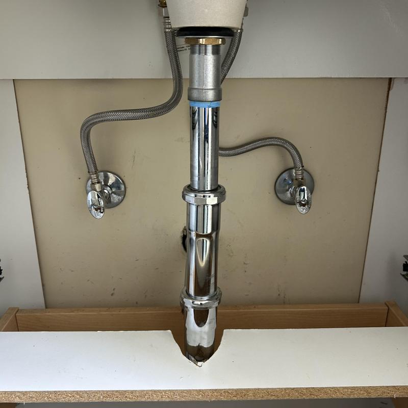 Sink P-trap and supply lines installation under cabinet