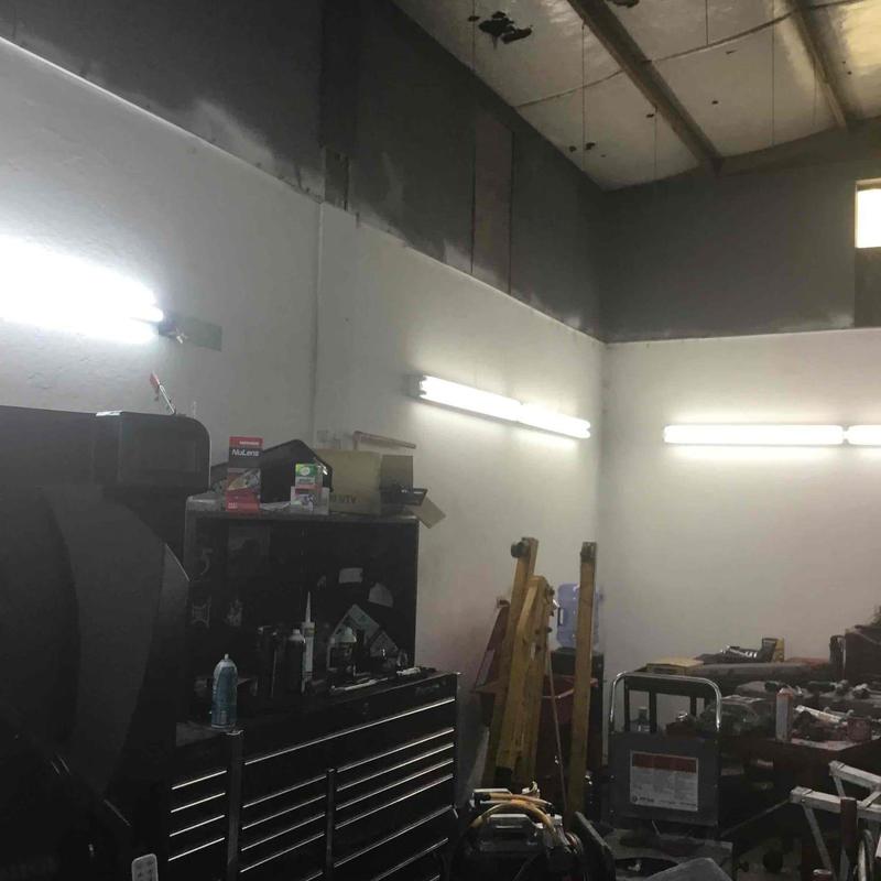 Water line installation with spickets on shop walls