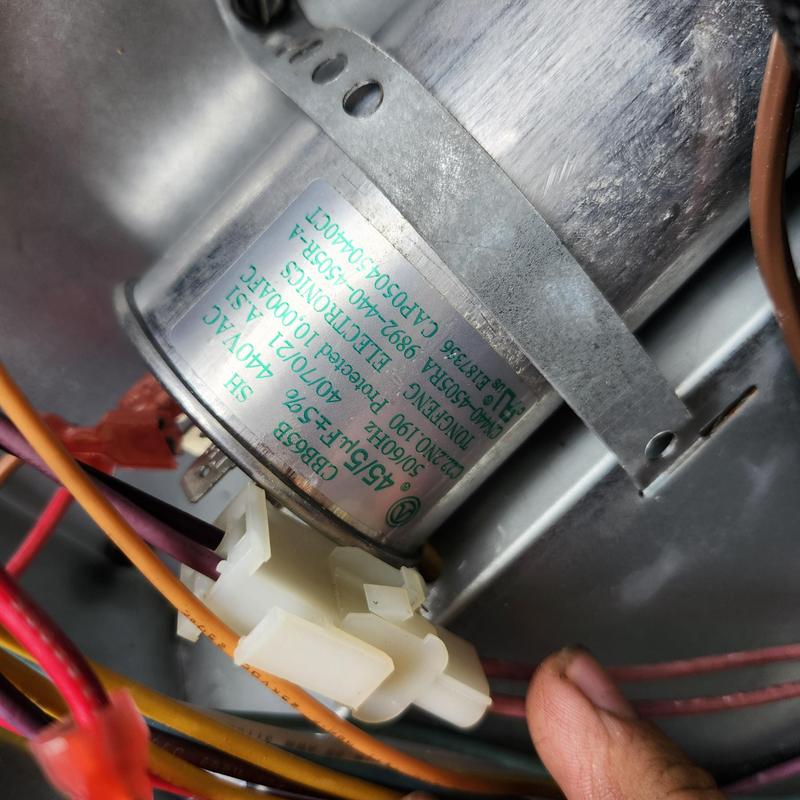 Electric motor in gas package HVAC system with wiring connections Electric motor in gas package HVAC system with wiring connections