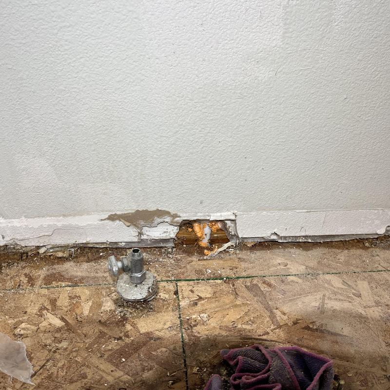 34 PEX waterlines behind drywall with damage and repair