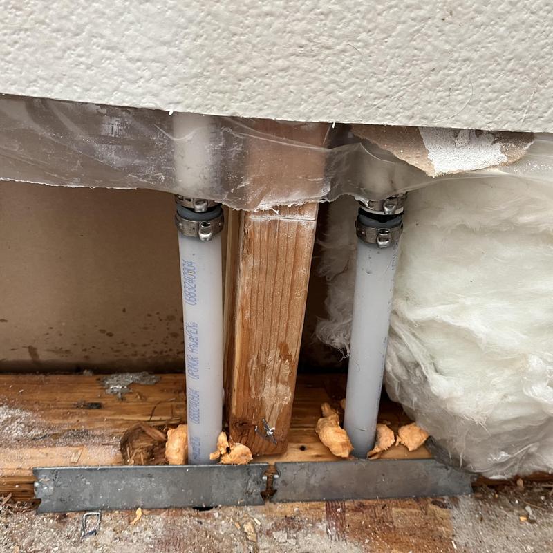 34 PEX waterlines behind drywall with clamps