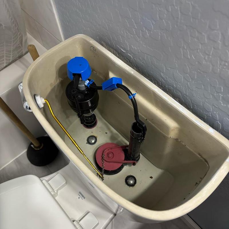 Toilet tank rebuild with flush valve and fill valve parts