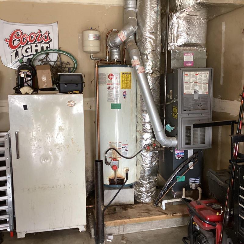 2006 Rheem gas water heater with leak and venting