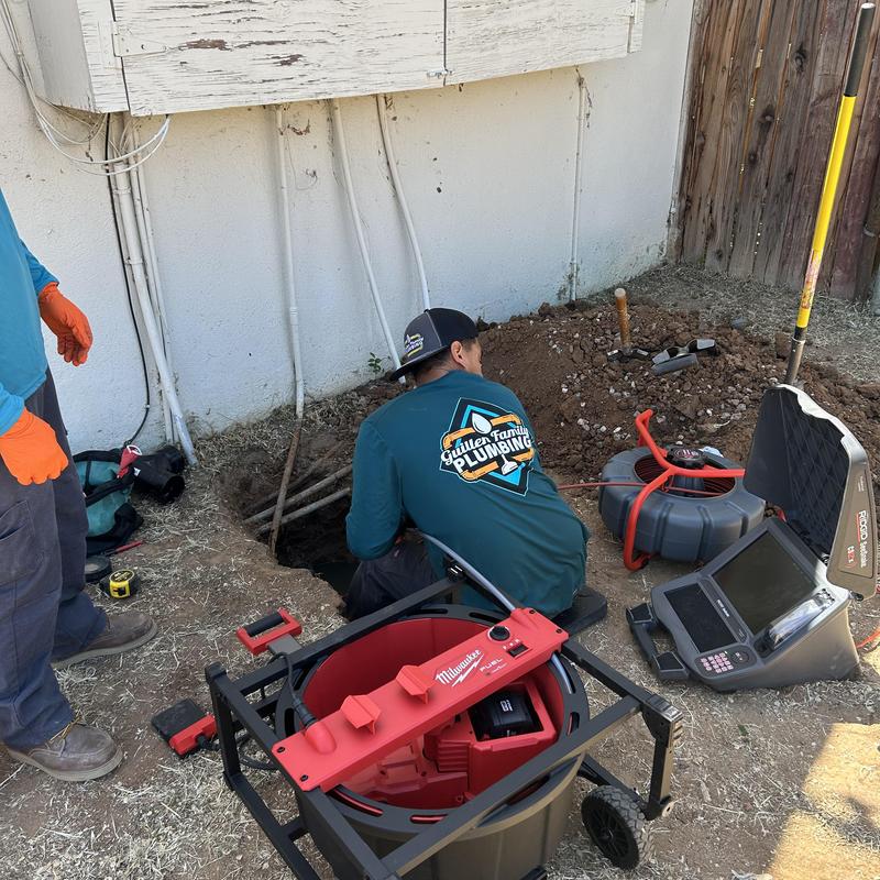 Broken drain line excavation with sewer camera inspection