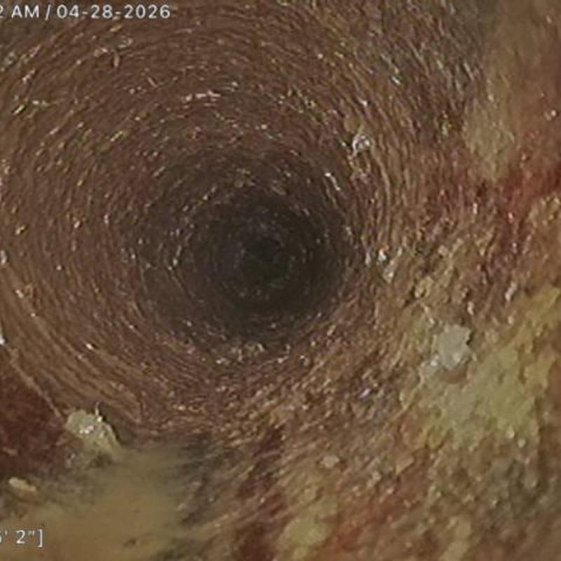 Cast-iron sewer pipe interior after cleaning and inspection