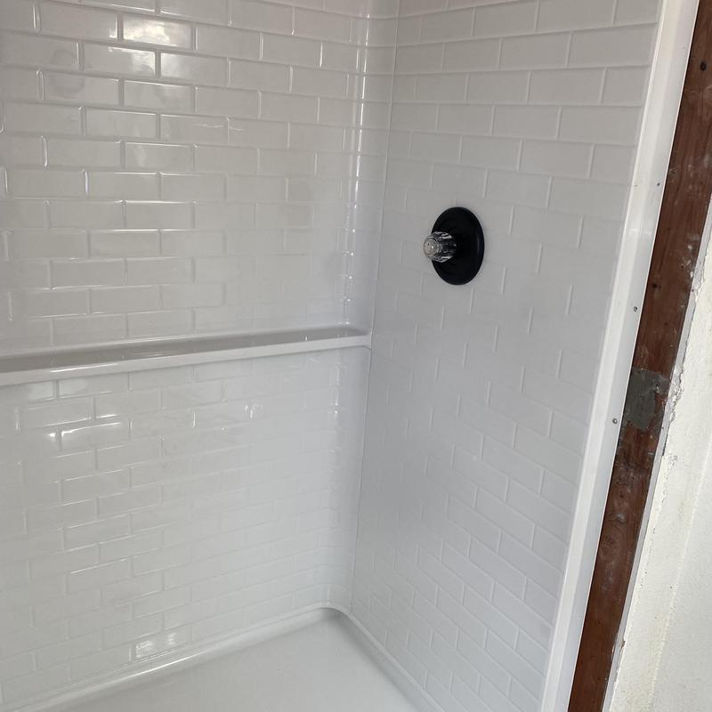 48x34 center drain shower pan with surround installed