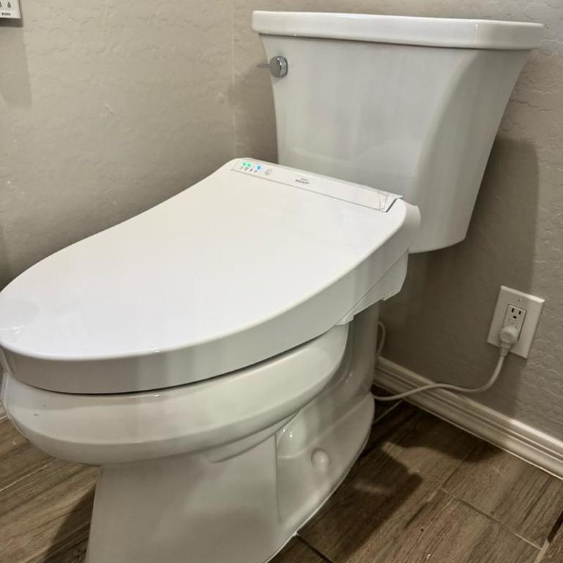 Kohler Highline Arc toilet with bidet seat installed