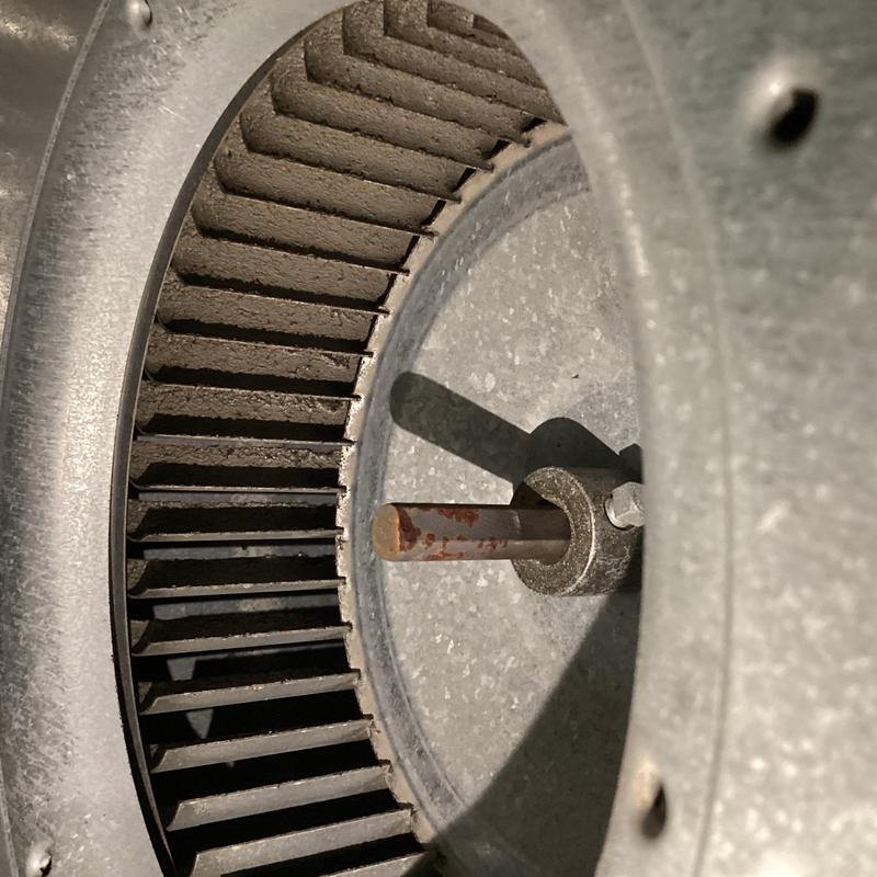 Blower wheel with rusted shaft inside HVAC system Blower wheel with rusted shaft inside HVAC system