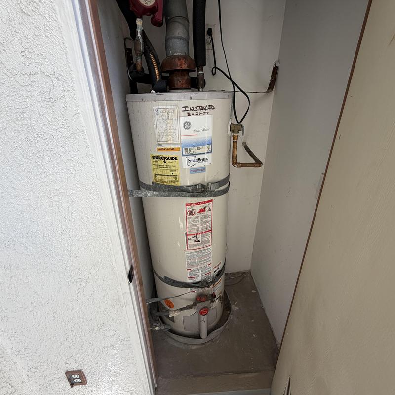 40-gallon Bradford White water heater in closet