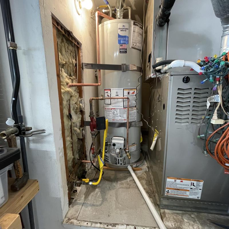 Natural gas water heater with new copper piping