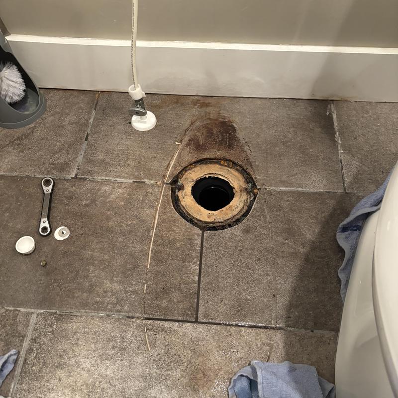 Toilet flange and wax ring old seal removed for replacement