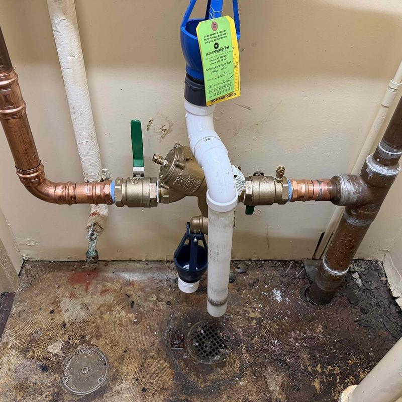 Backflow preventer with copper pipe spot repairs