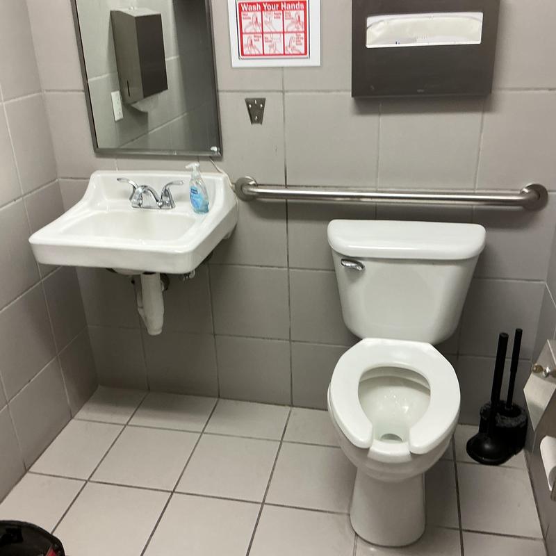 Toilet bowl and tank with accessible grab bar installation Toilet bowl and tank with accessible grab bar installation