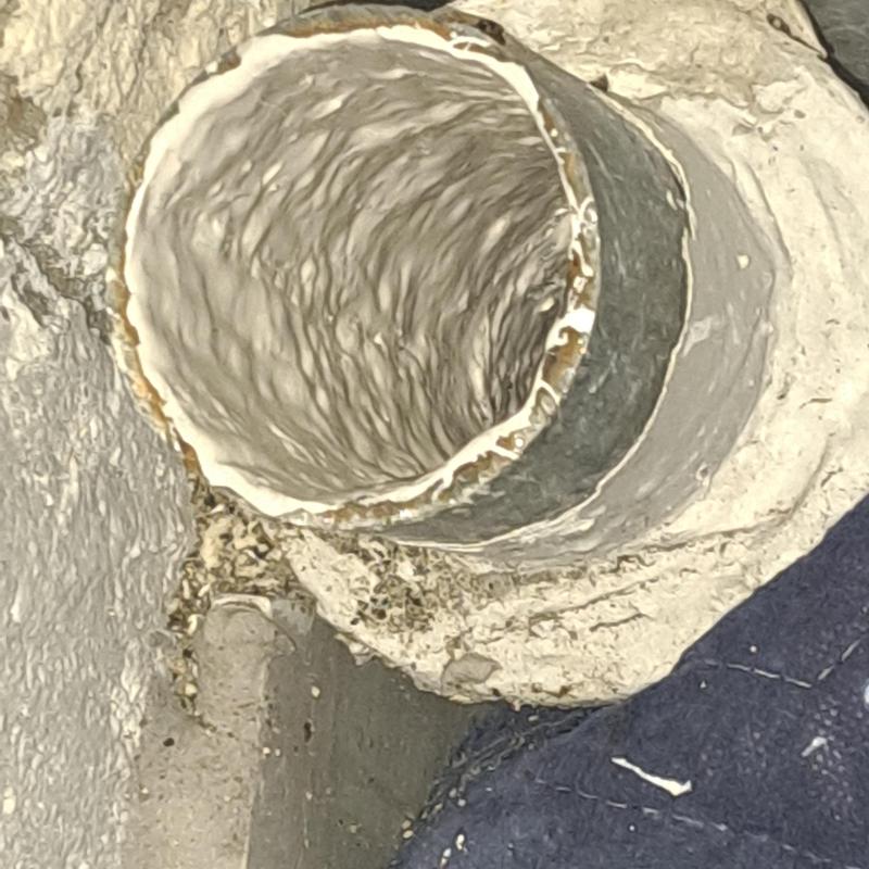 Laundry drain cast iron pipe with epoxy liner inside