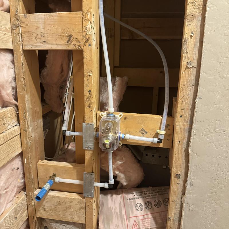 Shower waterline plumbing with hot and cold pipes installed Shower waterline plumbing with hot and cold pipes installed