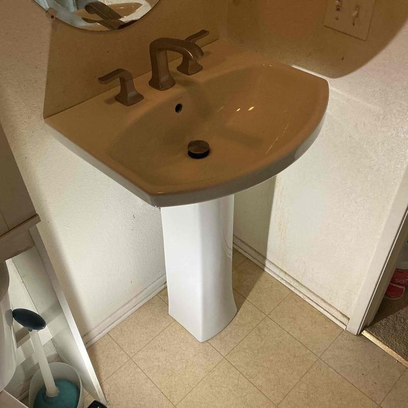 Pedestal sink with widespread faucet installation