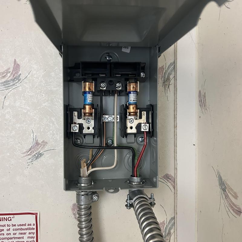 Electrical fuse box with wiring and conduit connections