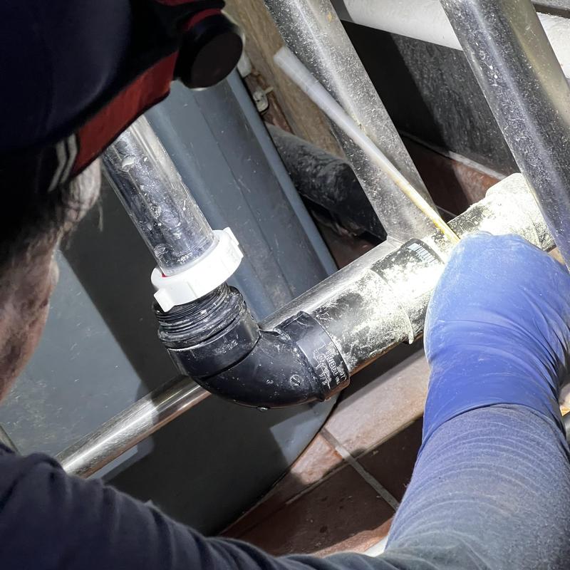 Vegetable sink drain plumbing installation under sink