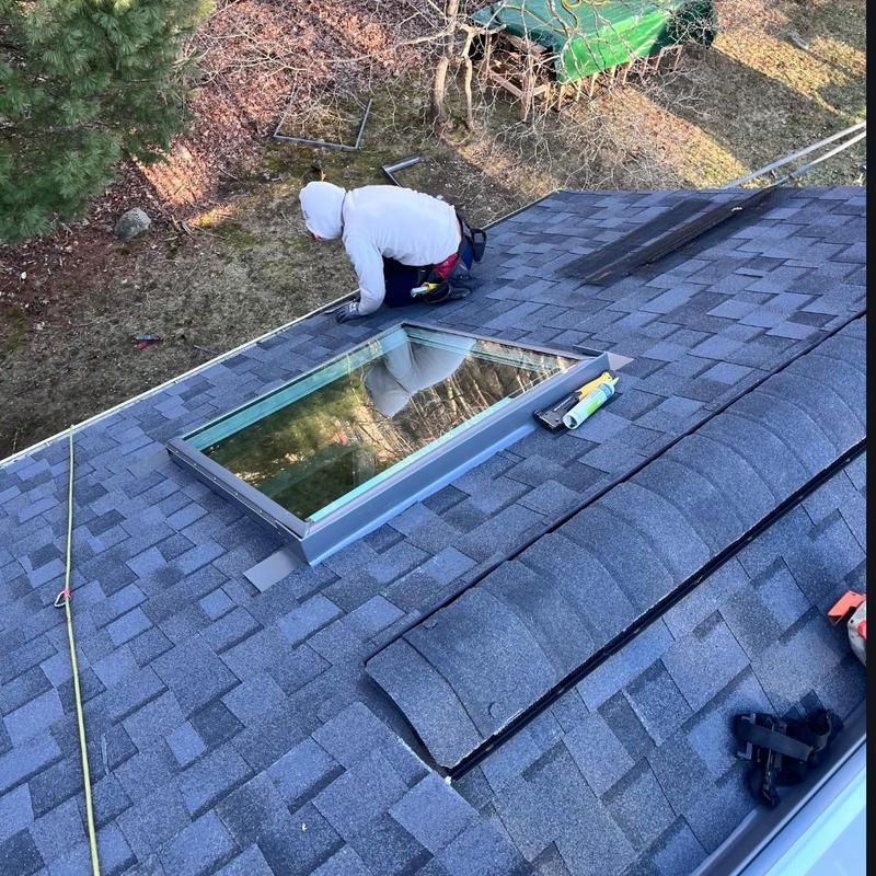 Skylight replacement on asphalt shingle roof