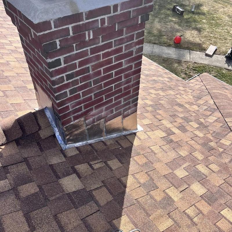 Shingle roof and chimney flashing with new ice and water shield