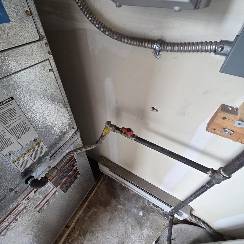 Gas line and HVAC furnace connection in utility room