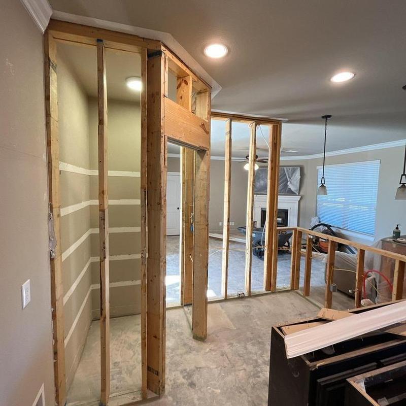 Interior wall framing and drywall patching in remodel