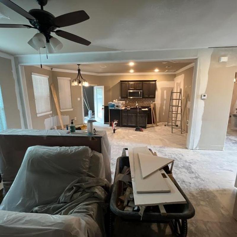 Kitchen cabinetry removal and drywall patching in remodel