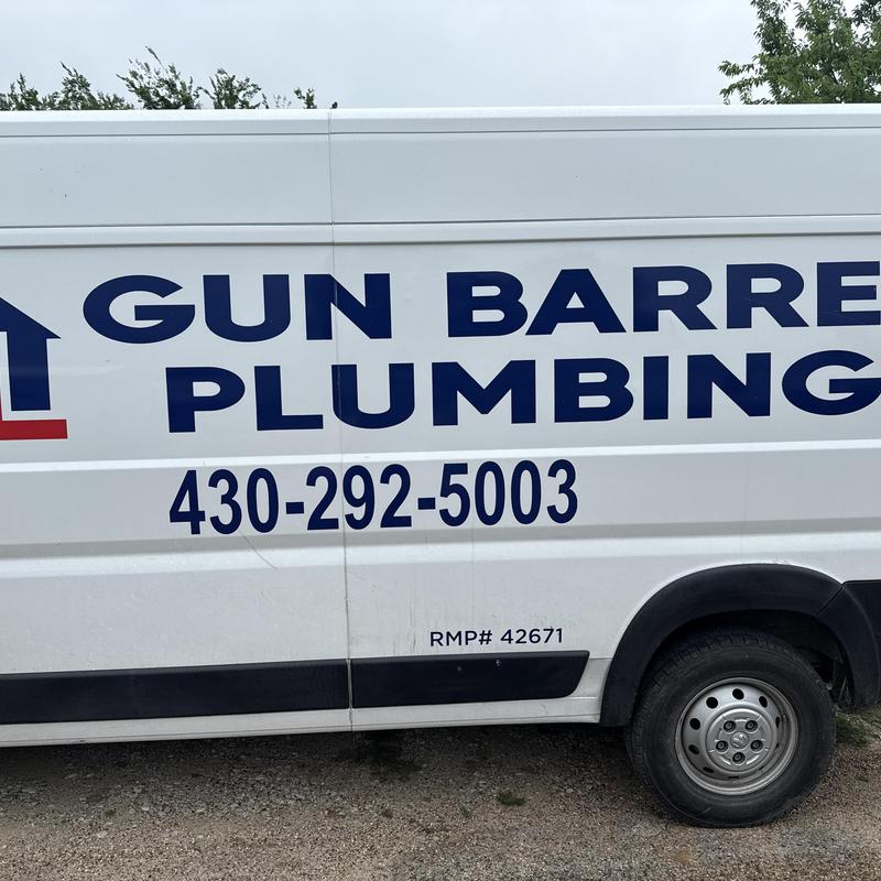 Water heater inspection van with plumbing service logo