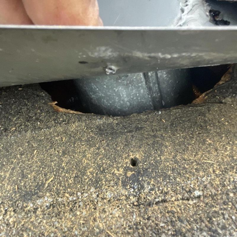 Furnace vent roof penetration with missing flashing