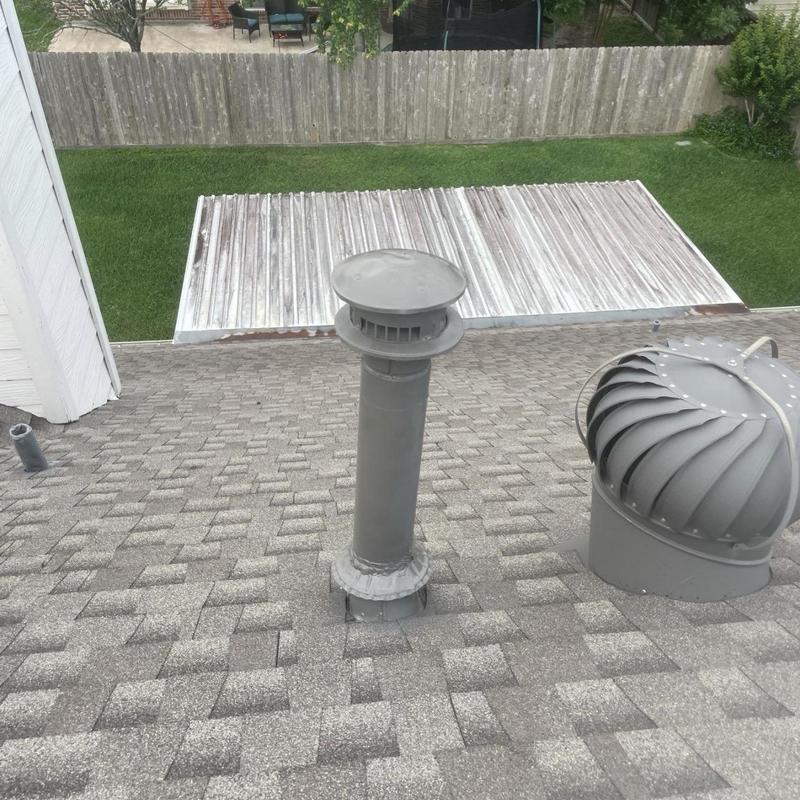 Furnace vent pipe with metal roof flashing