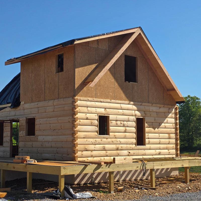Standing seam metal roof on new wood house framing Standing seam metal roof on new wood house framing