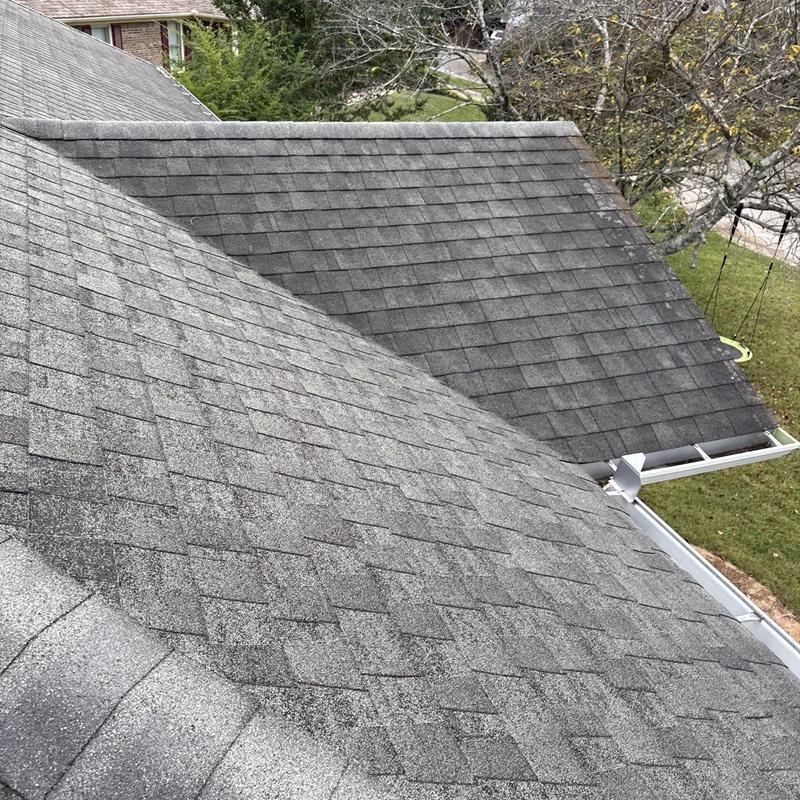 Asphalt shingle roof with hail damage inspection