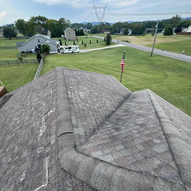 Roof shingles with hail damage markings in Tennessee