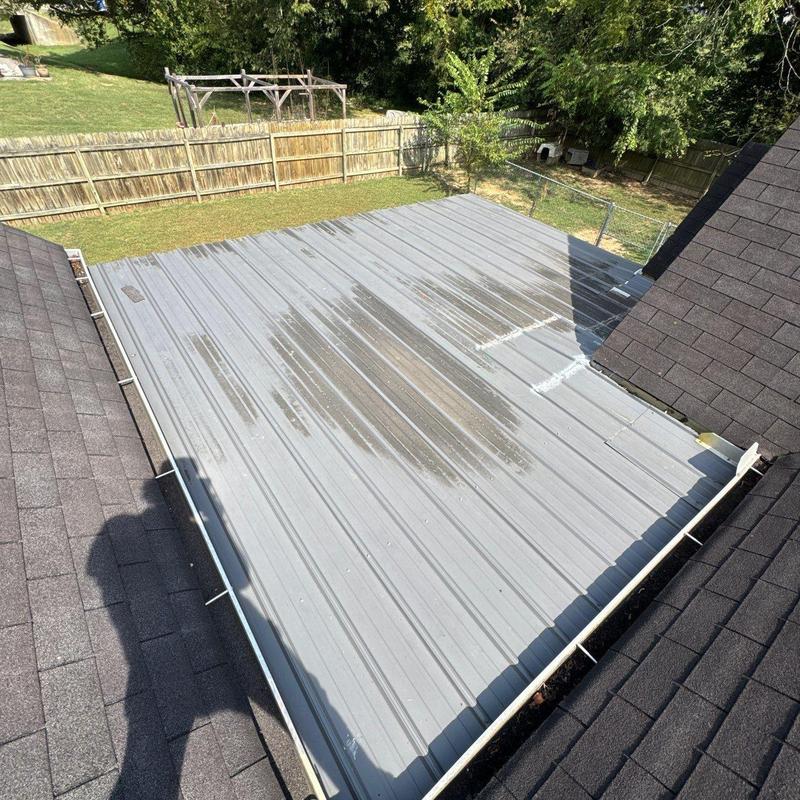 Metal roof panels with surface rust spots inspection