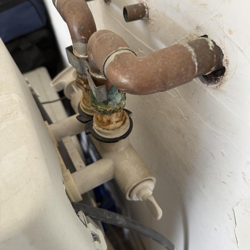 Water heater copper supply line with corrosion and leaks Water heater copper supply line with corrosion and leaks