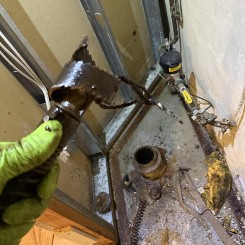 Main line pipe removal with corroded section in basement Main line pipe removal with corroded section in basement