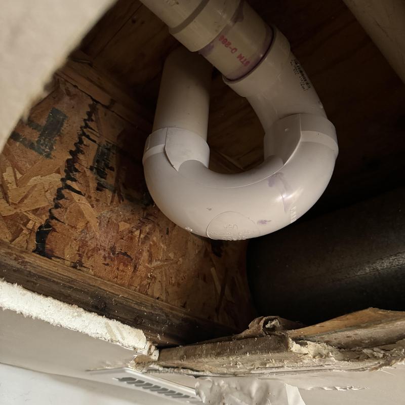 Condensate drain line P-trap in ceiling cavity