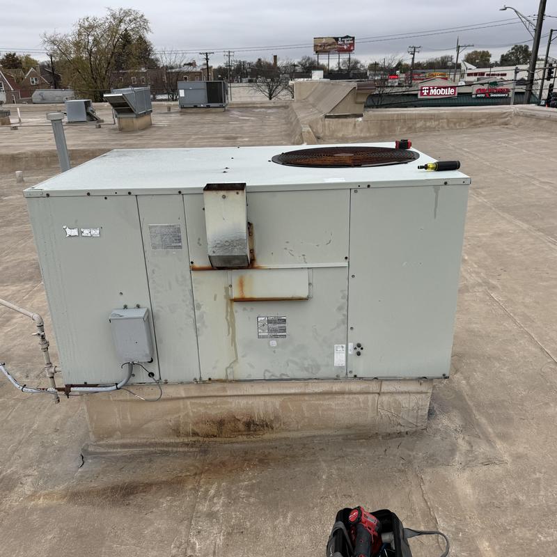 Commercial rooftop HVAC unit with limit switch replaced