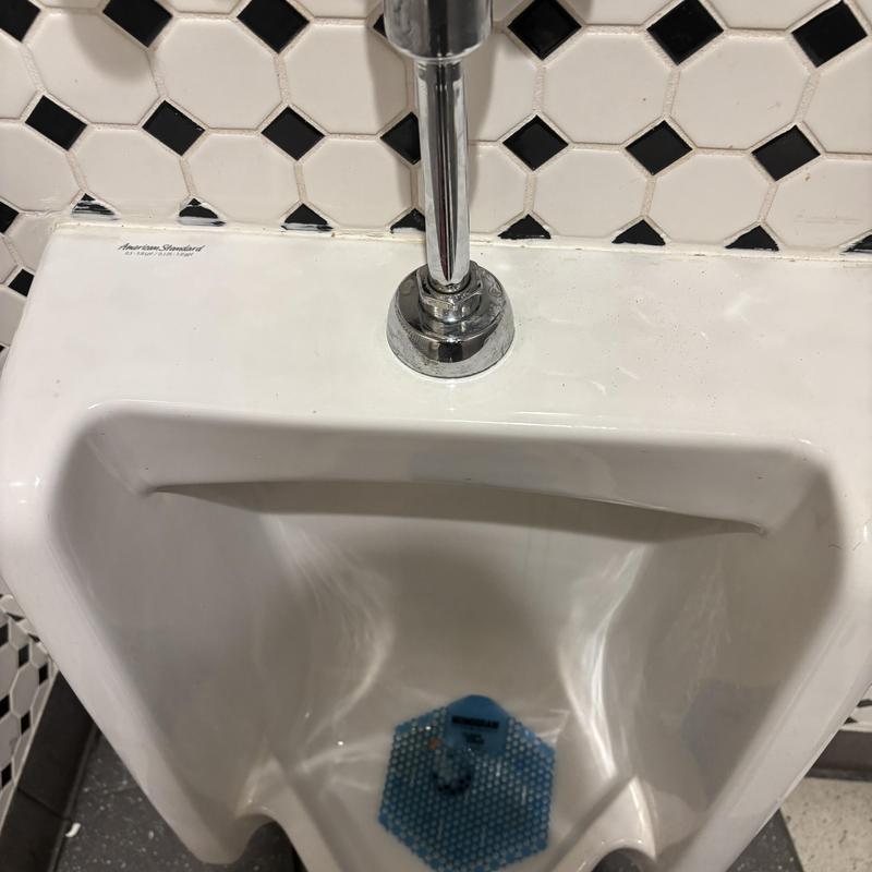 Men's urinal Sloan valve and flush pipe assembly Men's urinal Sloan valve and flush pipe assembly