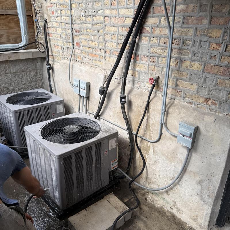 Condenser coil cleaning on outdoor AC units