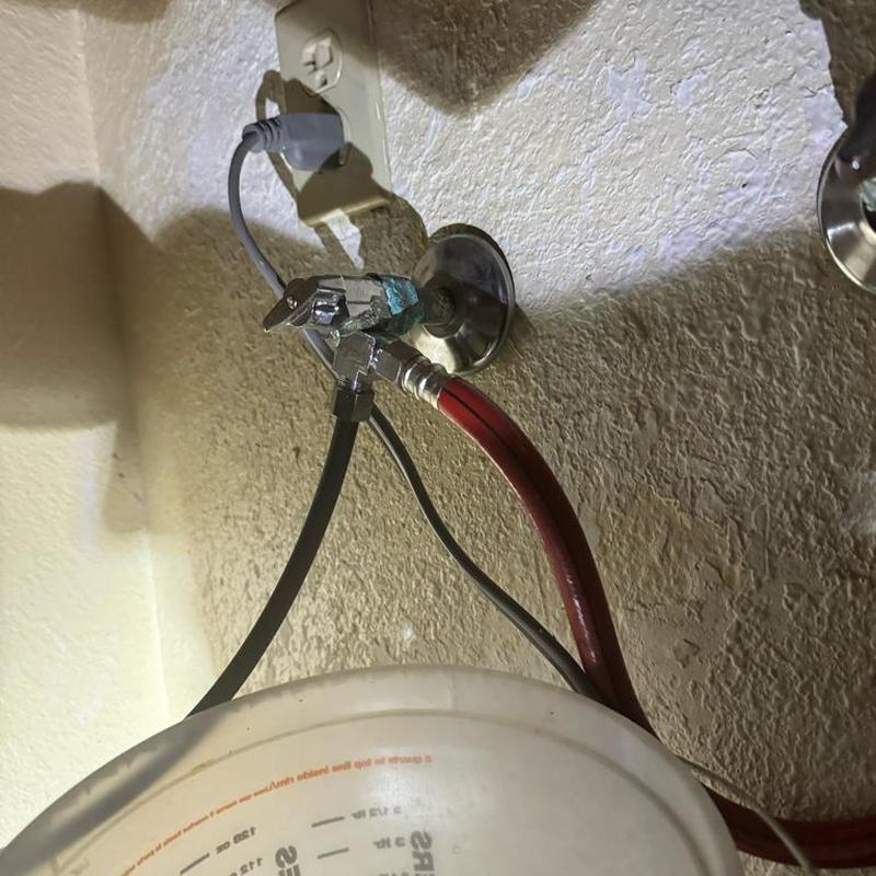 Hot side angle stop valve and dishwasher hose loop