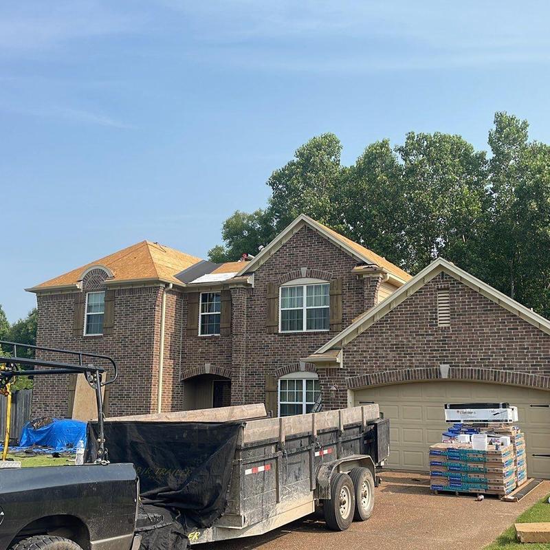 Asphalt shingle roof replacement prep at brick home