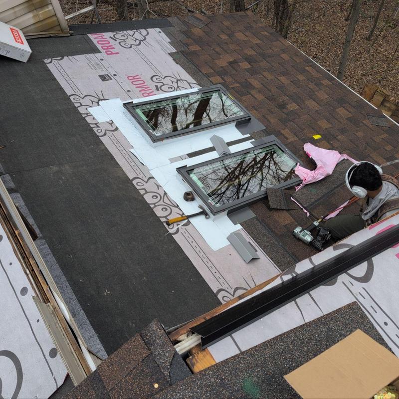 Skylight installation and roof shingle upgrade Skylight installation and roof shingle upgrade