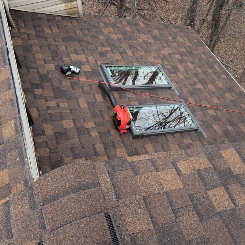 Roof skylights installed on new asphalt shingle roof Roof skylights installed on new asphalt shingle roof