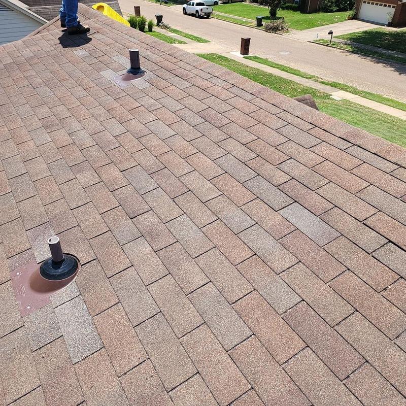 Pipe boot seals on asphalt shingle roof installation