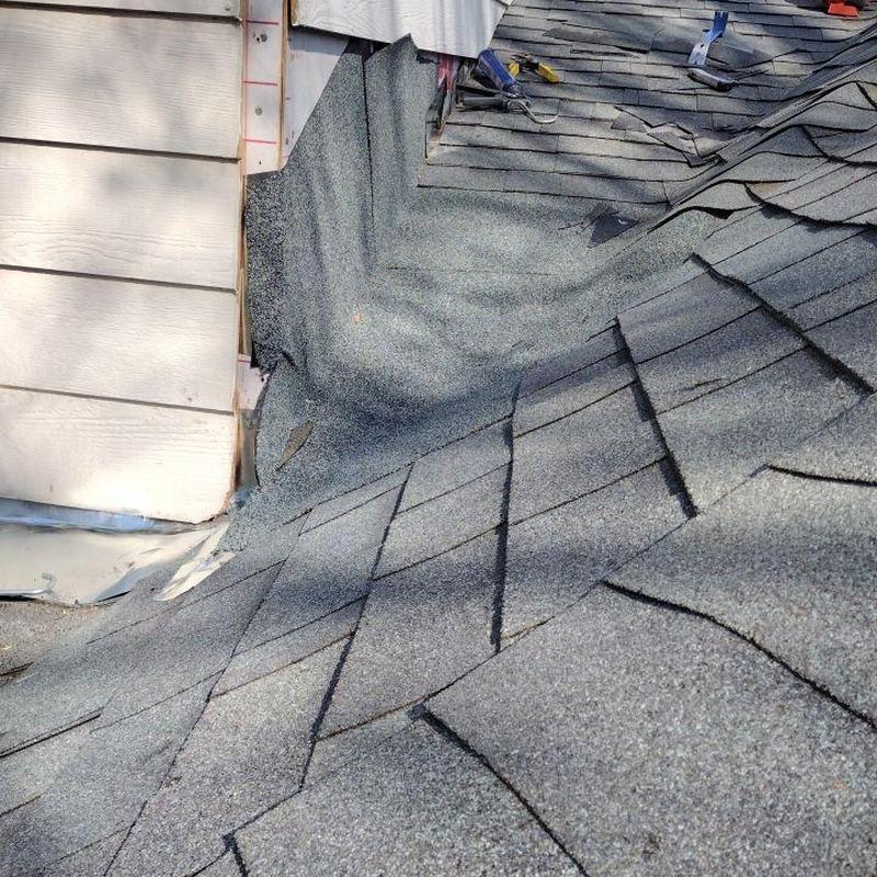 Dead valley metal pan with asphalt shingles installation