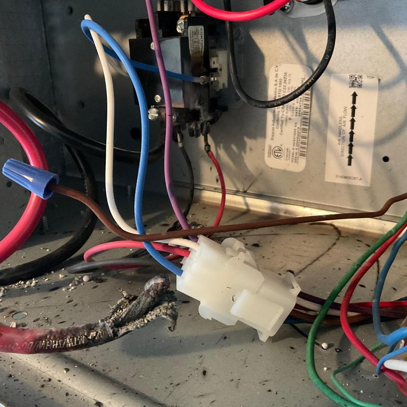 Heat strip wiring damaged from electrical short in HVAC unit
