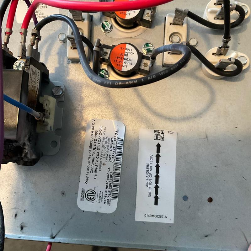 Heat strip assembly wiring and components inside HVAC unit
