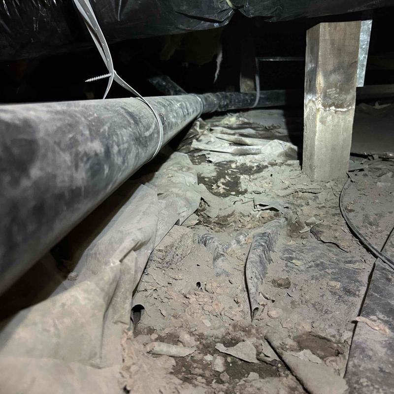 Mainline ABS pipe installation in crawl space