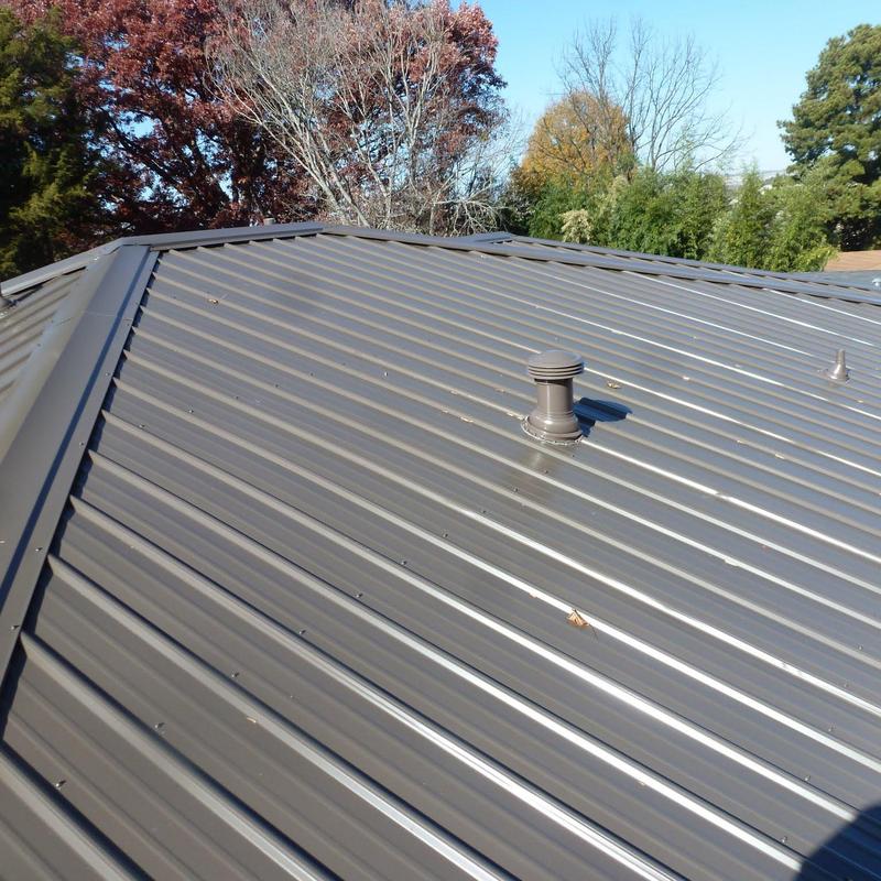 Standing seam metal roof with vent pipe